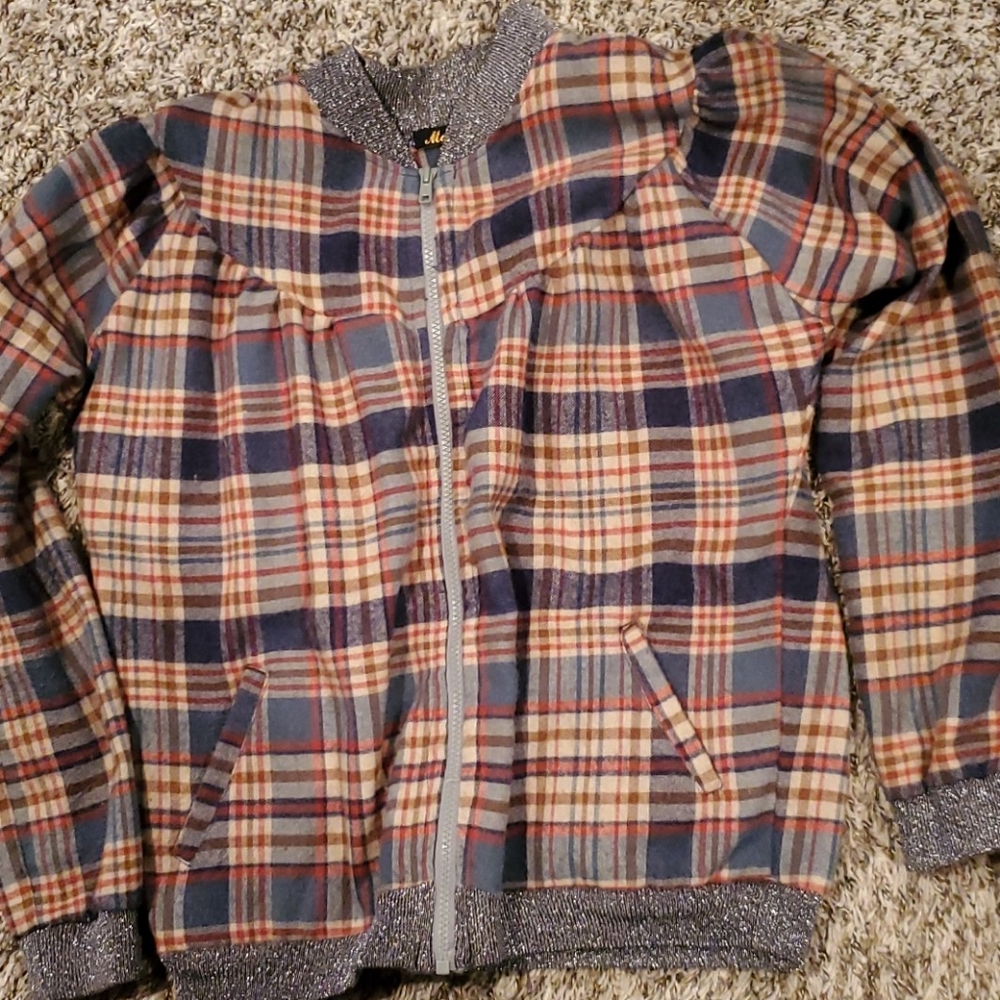 Light jacket with puffed sleeves glitter